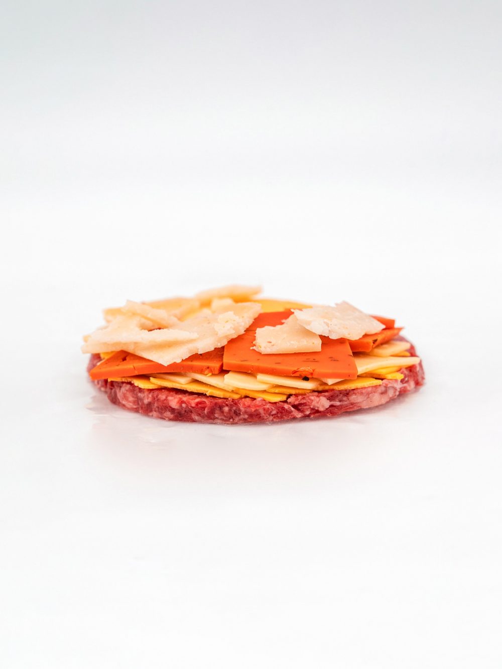 Hamburguesa rellena de cuatro quesos con pesto rojo (1 ud.)